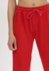 Pantaloni Roșii